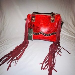 Leather fringe concealed carry